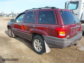 2001 Jeep Grand Cherokee Laredo with VIN 1J4GW48SX1C508609, listed as a IAAI auction lot 41780729 with 144,796 mi miles. Bid and sale history available at carsss.com. Image 3.
