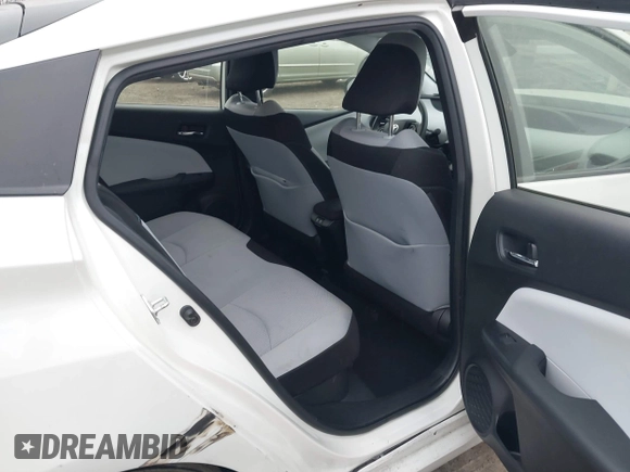 2019 Toyota Prius L Eco z VIN JTDKARFU8K3081187, wystawiony jako IAAI lot #41771346 z przebiegiem 64 864 mil mil oraz . Historia ofert i sprzedaży dostępna na DreamBid. Obrazek 8.
