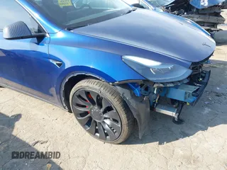 2022 Tesla Model Y Performance with VIN 7SAYGDEF7NF497076, listed as a IAAI auction lot 41759793 with 46,970 mi miles and . Bid and sale history available at DreamBid. Image 17.
