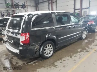 2014 Chrysler Town & Country Touring with VIN 2C4RC1BG4ER330039, listed as a IAAI auction lot 41335713 with 113,969 mi miles. Bid and sale history available at carsss.com. Image 4.