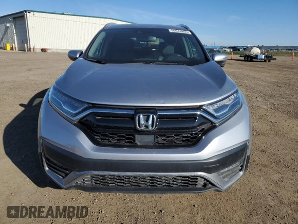 2021 Honda CR-V Touring z VIN 2HKRW2H96MH234964, wystawiony jako Copart lot #56044865 z przebiegiem 48 602 mil mil oraz Nie do naprawy • Non repairable. Historia ofert i sprzedaży dostępna na DreamBid. Obrazek 5.