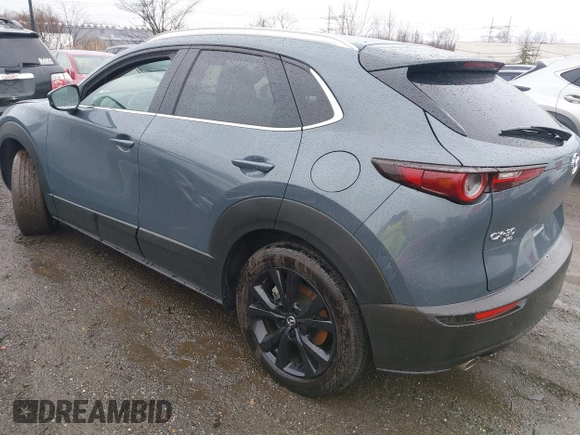 2024 Mazda CX-30 S Carbon Edition z VIN 3MVDMBCM7RM606050, wystawiony jako IAAI lot #41807459 z przebiegiem 7908 mil mil oraz . Historia ofert i sprzedaży dostępna na DreamBid. Obrazek 3.