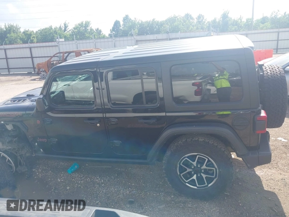 2024 Jeep Wrangler Rubicon with VIN 1C4PJXFG0RW271322, listed as a IAAI auction lot 42736647 with 32,319 mi miles and . Bid and sale history available at DreamBid. Image 14.