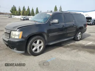 2007 Chevrolet Suburban LS with VIN 1GNFC16027J343774, listed as a Copart auction lot 76613034 with 0 mi miles and Salvage Title. Bid and sale history available at carsss.com. Image 1.