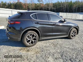 2019 Alfa Romeo Stelvio Ti Lusso z VIN ZASPAKBN0K7C71285, wystawiony jako Copart lot #83194964 z przebiegiem 59 811 mil mil oraz Szkoda całkowita • Salvage title. Historia ofert i sprzedaży dostępna na DreamBid. Obrazek 3.