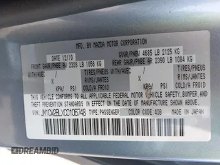 2012 Mazda 5 Sport with VIN JM1CW2BLXC0106748, listed as a IAAI auction lot 42435965 with 153,786 mi miles and . Bid and sale history available at DreamBid. Image 9.