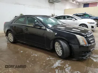 2011 Cadillac CTS Luxury with VIN 1G6DG5EY2B0168205, listed as a Copart auction lot 57127355 with 124,199 mi miles and Clean title. Bid and sale history available at DreamBid. Image 4.
