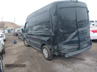 2017 Ford Transit Passenger XL with VIN 1FMZK1CM8HKA07893, listed as a IAAI auction lot 41253911 with 98,365 mi miles and . Bid and sale history available at DreamBid. Image 3.