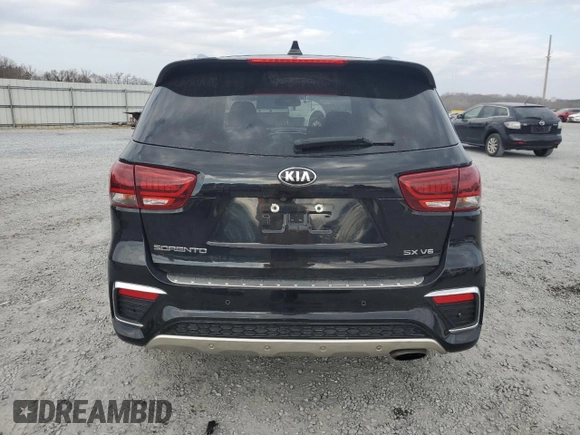 2019 Kia Sorento SX z VIN 5XYPK4A56KG504625, wystawiony jako Copart lot #44370205 z przebiegiem 118 051 mil mil oraz Szkoda całkowita • Salvage title. Historia ofert i sprzedaży dostępna na DreamBid. Obrazek 6.