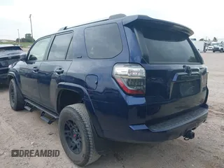 2023 Toyota 4Runner SR5 with VIN JTEEU5JR2P5297771, listed as a IAAI auction lot 42640698 with 49,151 mi miles and . Bid and sale history available at DreamBid. Image 3.