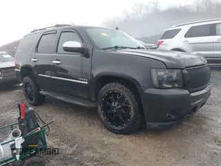 2010 Chevrolet Tahoe LTZ with VIN 1GNUKCE05AR146131, listed as a IAAI auction lot 41455249 with 194,538 mi miles and . Bid and sale history available at DreamBid. Image 1.