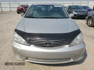 2006 Toyota Camry LE z VIN 4T1BF30K66U115872, wystawiony jako Copart lot #60526695 z przebiegiem 164 561 mil mil oraz Szkoda całkowita • Salvage title. Historia ofert i sprzedaży dostępna na DreamBid. Obrazek 5.