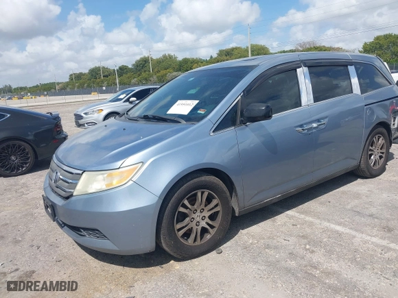 2013 Honda Odyssey EX-L with VIN 5FNRL5H6XDB045071, listed as a IAAI auction lot 41951012 with 165,965 mi miles. Bid and sale history available at carsss.com. Image 18.