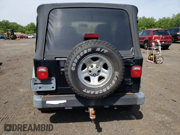 2002 Jeep Wrangler X with VIN 1J4FA39S12P759967, listed as a Copart auction lot 57851495 with 178,035 mi miles and Salvage title. Bid and sale history available at DreamBid. Image 6.