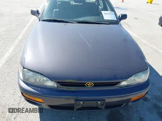 1996 Toyota Camry DX with VIN 4T1BG12K8TU915891, listed as a IAAI auction lot 41874731 with 57,564 mi miles. Bid and sale history available at carsss.com. Image 12.