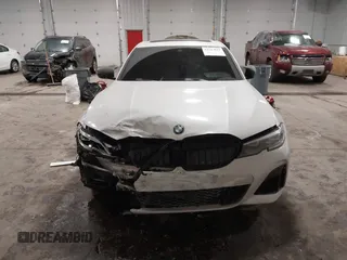 2020 BMW 3 Series M340i xDrive with VIN WBA5U9C08LFJ73063, listed as a IAAI auction lot 41513641 with 52,431 mi miles and . Bid and sale history available at DreamBid. Image 12.