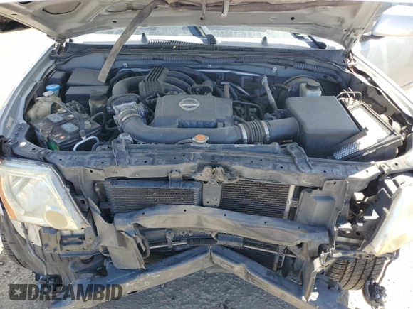 2010 Nissan Xterra S with VIN 5N1AN0NU2AC519838, listed as a Copart auction lot 57301355 with 129,990 mi miles and Salvage title. Bid and sale history available at DreamBid. Image 12.