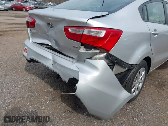 2013 Kia Rio LX with VIN KNADM4A36D6272803, listed as a IAAI auction lot 41849872 with 62,918 mi miles. Bid and sale history available at carsss.com. Image 6.