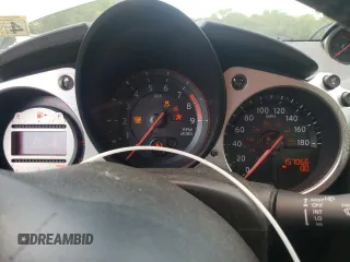 2009 Nissan 370Z Touring with VIN JN1AZ44E49M402605, listed as a Copart auction lot 55972355 with 157,066 mi miles and Clean Title. Bid and sale history available at DreamBid. Image 9.