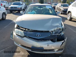2002 Toyota Solara SE z VIN 2T1CF28P82C555053, wystawiony jako IAAI lot #41414314 z przebiegiem 115 444 mil mil oraz . Historia ofert i sprzedaży dostępna na DreamBid. Obrazek 13.
