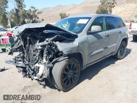 2020 Jeep Grand Cherokee Laredo E with VIN 1C4RJEAG3LC247027, listed as a IAAI auction lot 42538279 with 97,601 mi miles and . Bid and sale history available at DreamBid. Image 17.