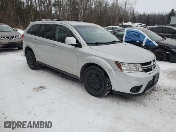 2013 Dodge Journey Crew with VIN 3C4PDCCG4DT698618, listed as a Copart auction lot 87632875 with 198,284 mi miles and Salvage title. Bid and sale history available at DreamBid. Image 4.