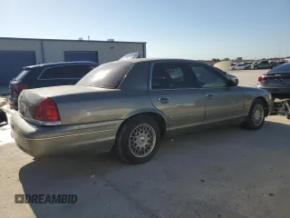 2002 Ford Crown Victoria Standard с VIN 2FAFP73WX2X103936, выставлен на аукционе Copart как лот 67688374 с пробегом 161 511 миль миль и Списание • Salvage title. История ставок и продаж доступна на DreamBid. Изображение 3.