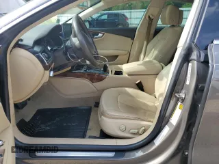 2012 Audi A7 Prestige z VIN WAUSGAFC3CN025880, wystawiony jako Copart lot #58922235 z przebiegiem 148 652 mil mil oraz Szkoda całkowita • Salvage title. Historia ofert i sprzedaży dostępna na DreamBid. Obrazek 7.