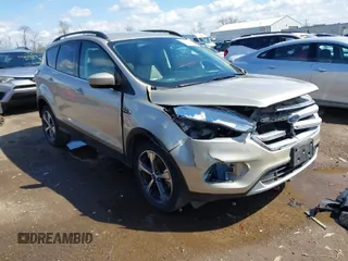 2018 Ford Escape SEL with VIN 1FMCU9HD1JUD49543, listed as a IAAI auction lot 42003218 with 122,768 mi miles. Bid and sale history available at carsss.com. Image 1.
