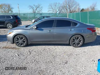 2018 Nissan Altima 2.5 SR with VIN 1N4AL3AP7JC240029, listed as a IAAI auction lot 41883209 with 77,190 mi miles. Bid and sale history available at carsss.com. Image 14.