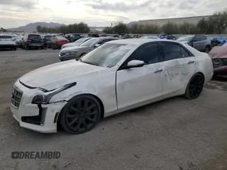 2014 Cadillac CTS Premium RWD z VIN 1G6AT5S30E0142990, wystawiony jako Copart lot #50801685 z przebiegiem 74 583 mil mil oraz Szkody całkowita. Historia ofert i sprzedaży dostępna na DreamBid. Obrazek 1.