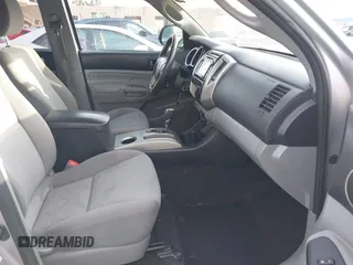 2014 Toyota Tacoma PreRunner with VIN 3TMJU4GN0EM163253, listed as a IAAI auction lot 41559780 with 155,883 mi miles. Bid and sale history available at carsss.com. Image 5.