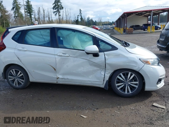 2019 Honda Fit EX z VIN 3HGGK5H88KM716257, wystawiony jako IAAI lot #41936677 z przebiegiem 133 463 mil mil oraz . Historia ofert i sprzedaży dostępna na DreamBid. Obrazek 13.