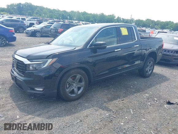 2023 Honda Ridgeline RTL-E with VIN 5FPYK3F71PB022739, listed as a IAAI auction lot 42447428 with 19,702 mi miles and . Bid and sale history available at DreamBid. Image 17.