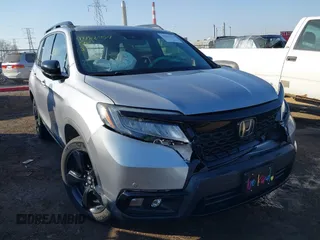 2019 Honda Passport Elite with VIN 5FNYF8H04KB006733, listed as a IAAI auction lot 41782454 with 74,713 mi miles. Bid and sale history available at carsss.com. Image 1.
