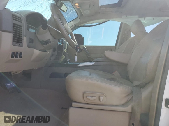 2013 Nissan Titan SL with VIN 1N6BA0ECXDN304659, listed as a Copart auction lot 50101345 with 153,951 mi miles and Clean Title. Bid and sale history available at DreamBid. Image 7.