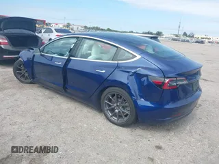 2020 Tesla Model 3 Standard Range Plus with VIN 5YJ3E1EA7LF785838, listed as a IAAI auction lot 41586081 with 38,392 mi miles and . Bid and sale history available at carsss.com. Image 3.