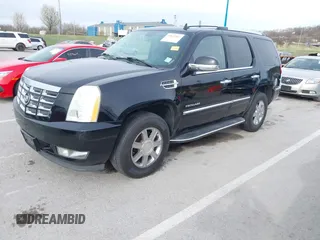 2007 Cadillac Escalade z VIN 1GYFK63837R424460, wystawiony jako IAAI lot #41859862 z przebiegiem 138 690 mil mil oraz . Historia ofert i sprzedaży dostępna na DreamBid. Obrazek 2.
