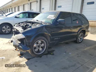 2003 Chevrolet Blazer Xtreme z VIN 1GNCS18X23K107727, wystawiony jako Copart lot #45859075 z przebiegiem 233 270 mil mil oraz Szkoda całkowita • Salvage title. Historia ofert i sprzedaży dostępna na DreamBid. Obrazek 1.