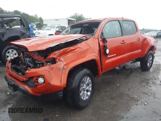 2017 Toyota Tacoma SR5 with VIN 5TFDZ5BN0HX015629, listed as a IAAI auction lot 42002103 with 127,829 mi miles. Bid and sale history available at carsss.com. Image 2.