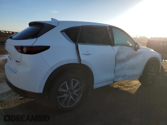 2018 Mazda CX-5 Grand Touring with VIN JM3KFBDM7J0370662, listed as a Copart auction lot 48602585 with 67,875 mi miles and Salvage Title. Bid and sale history available at DreamBid. Image 3.