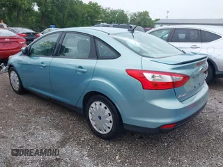 2012 Ford Focus SE with VIN 1FAHP3F29CL464650, listed as a IAAI auction lot 42495994 with 142,336 mi miles and . Bid and sale history available at DreamBid. Image 3.
