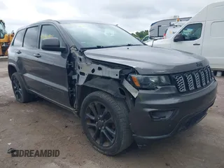 2018 Jeep Grand Cherokee Altitude z VIN 1C4RJFAGXJC190814, wystawiony jako IAAI lot #42660901 z przebiegiem 127 632 mil mil oraz . Historia ofert i sprzedaży dostępna na DreamBid. Obrazek 1.