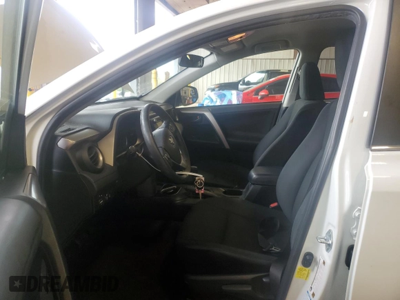 2018 Toyota RAV4 LE with VIN JTMBFREV2JJ182828, listed as a Copart auction lot 55668945 with 164,683 mi miles and Salvage Title. Bid and sale history available at DreamBid. Image 7.