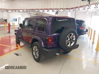 2023 Jeep Wrangler High Altitude z VIN 1C4HJXEN9PW560958, wystawiony jako IAAI lot #42393559 z przebiegiem 35 981 mil mil oraz . Historia ofert i sprzedaży dostępna na DreamBid. Obrazek 3.