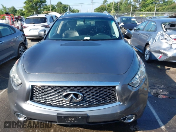 2017 Infiniti QX70 z VIN JN8CS1MW4HM410322, wystawiony jako IAAI lot #42285313 z przebiegiem 126 031 mil mil oraz . Historia ofert i sprzedaży dostępna na DreamBid. Obrazek 12.