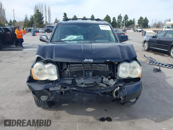 2009 Jeep Grand Cherokee with VIN 1J8HS68T49C524111, listed as a IAAI auction lot 41605917 with 133,441 mi miles and . Bid and sale history available at DreamBid. Image 13.