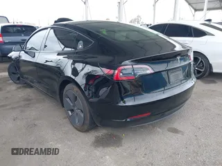 2023 Tesla Model 3 with VIN 5YJ3E1EA7PF473749, listed as a IAAI auction lot 41921478 with 21,483 mi miles and . Bid and sale history available at DreamBid. Image 3.