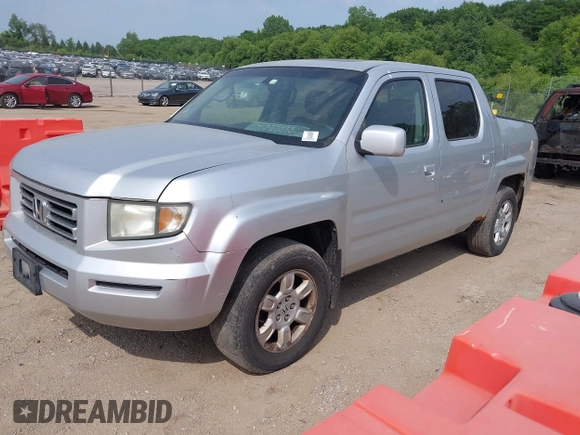 2007 Honda Ridgeline RTL z VIN 2HJYK16517H530890, wystawiony jako IAAI lot #42521976 z przebiegiem 285 222 mil mil oraz . Historia ofert i sprzedaży dostępna na DreamBid. Obrazek 2.