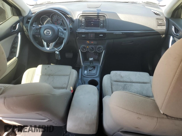 2014 Mazda CX-5 Touring z VIN JM3KE2CYXE0327950, wystawiony jako Copart lot #51390585 z przebiegiem 129 523 mil mil oraz Czysty tytuł • Clean title. Historia ofert i sprzedaży dostępna na DreamBid. Obrazek 8.